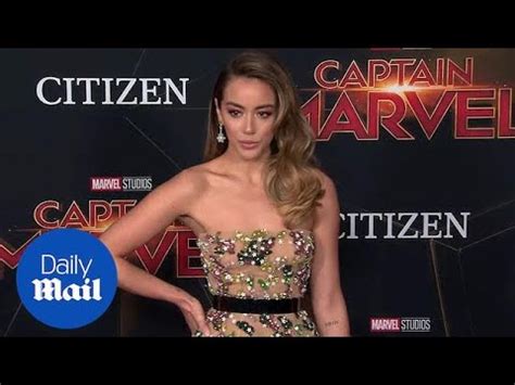 Chloe Bennet radiates in nude dress at Captain Marvel premiere